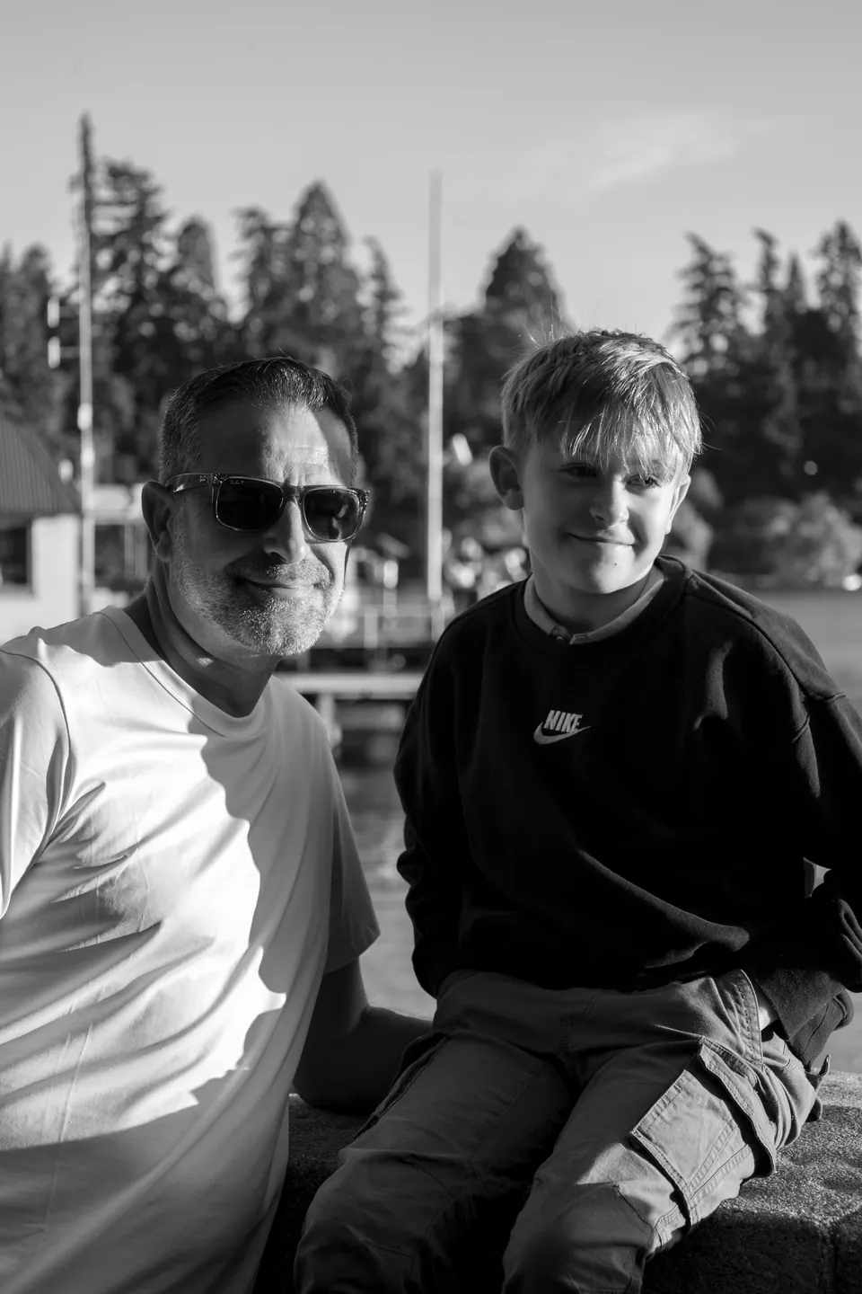 Black and white photograph of two people outdoors